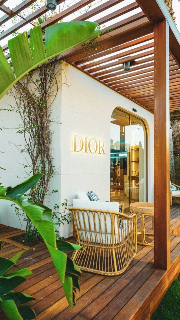 Elegant outdoor view of a Dior pop-up store with modern architecture.